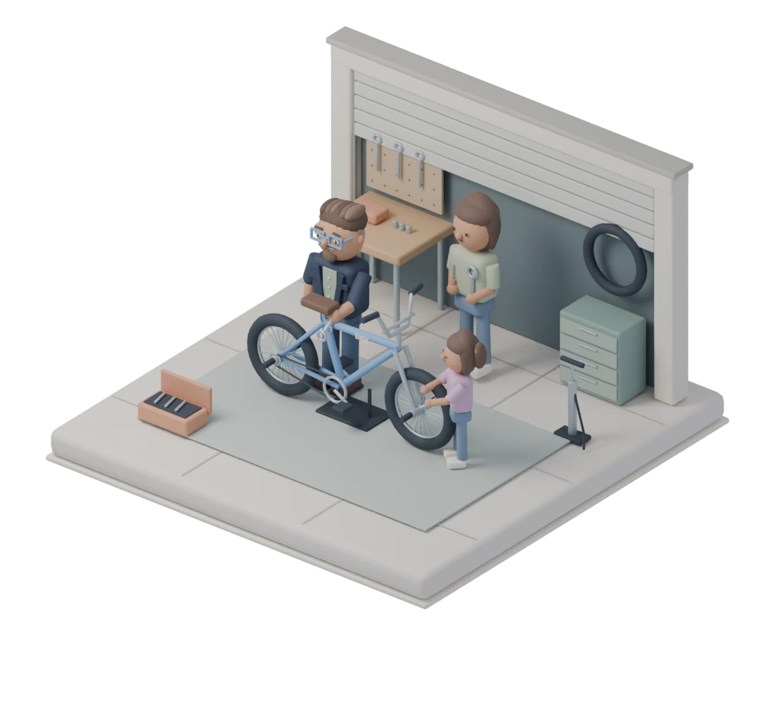 Michael and his daughter working on a BMX outside a garage, with his wife helping